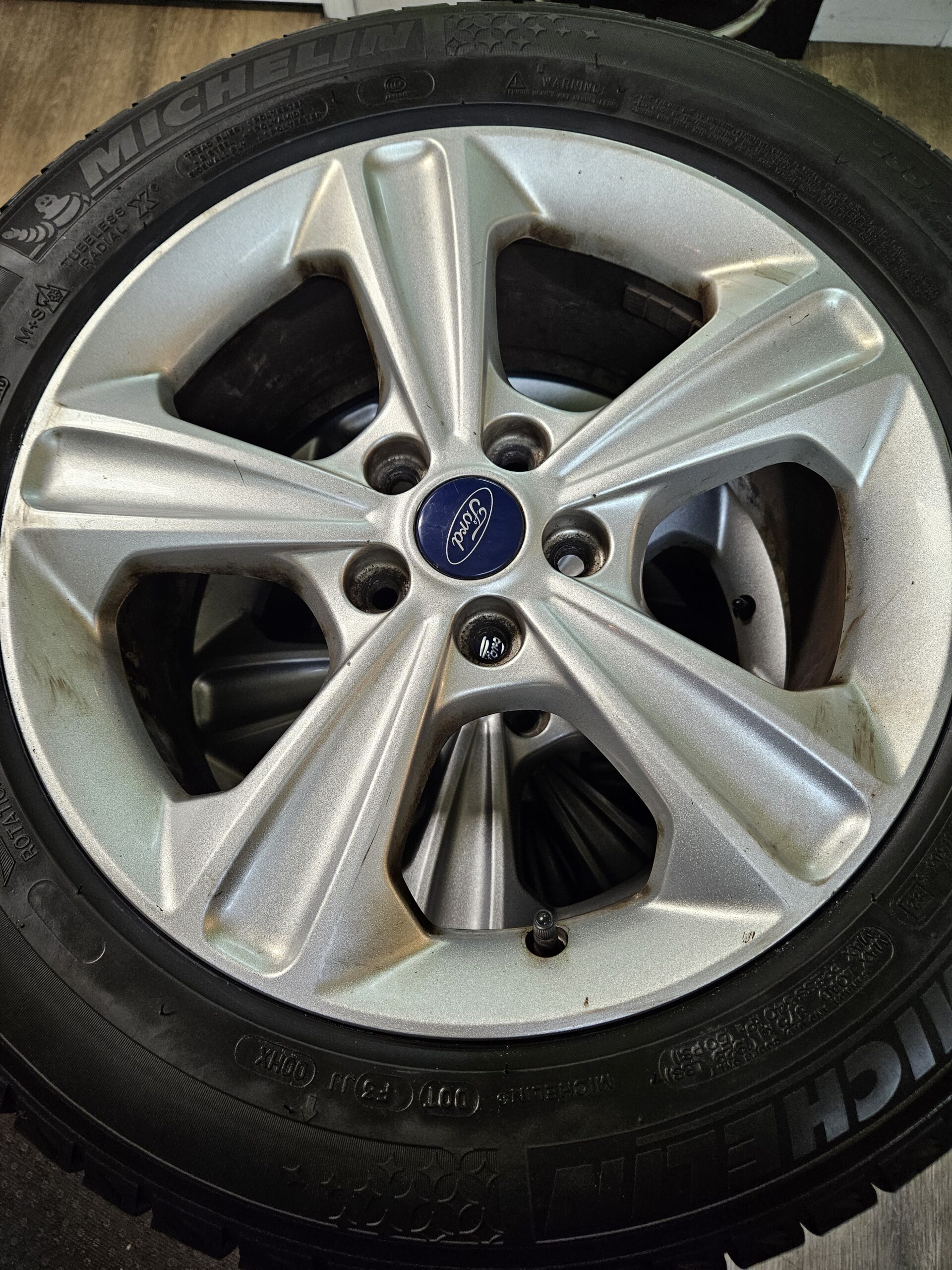 235/55R17 Michelin Snow Tires on Ford Escape Rims